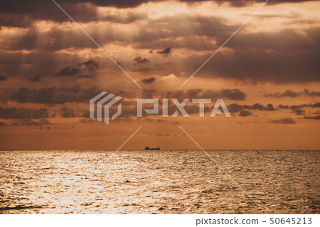 Sunrise with a boat Sunrise with a boat 50645213