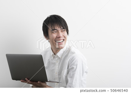 Young man white background laptop Young man white background laptop 50646540