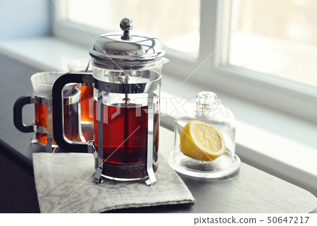 Cups of tea  with french press 50647217