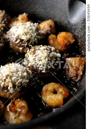 Ahijo of shrimp and mushrooms 50649494