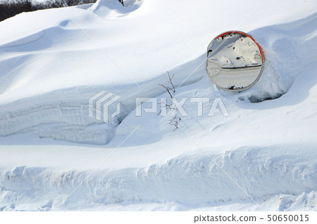 Curve mirror buried in snow 50650015