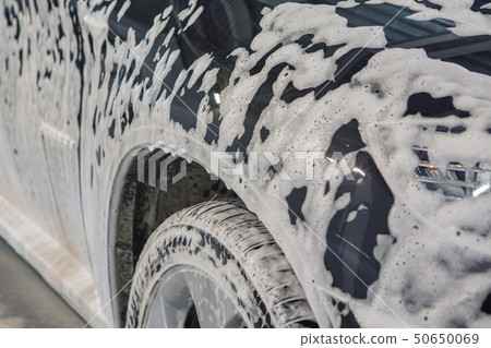 car wash. Detail of the machine in the foam close-up. the surface of the machine car wash. Detail of the machine in the foam close-up. the surface of the machine 50650069