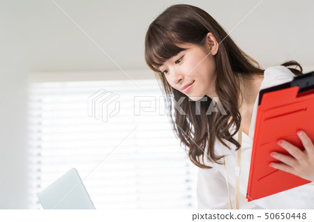 Young lady, business woman, office casual Young lady, business woman, office casual 50650448