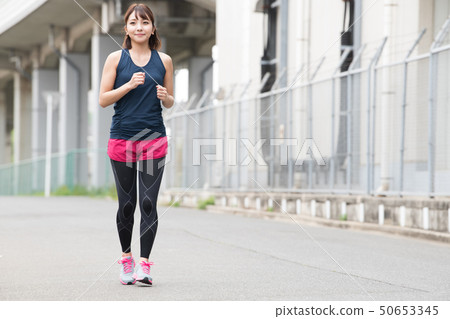 Young Japanese Woman Running Jogging Sport Young Japanese Woman Running Jogging Sport 50653345