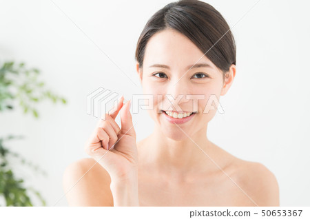 photo of woman with pills 50653367