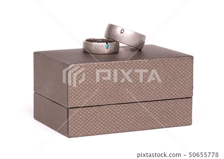 Wedding rings on box 50655778