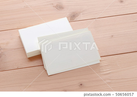 Mockup of business cards on wood textured Mockup of business cards on wood textured 50656057