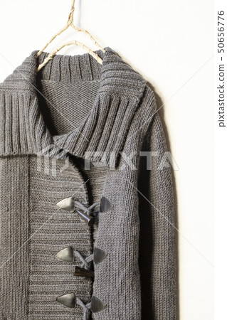 Dark gray thick cardigan on white background 50656776