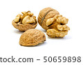 Walnuts, whole and opened on white background 50659898