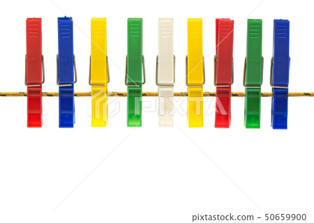 Colorful cloth pegs on white background 50659900