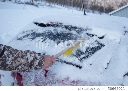 Hand driver using brush sweeping snow on Hand driver using brush sweeping snow on 50662021