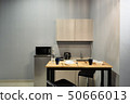 A modern kitchen in a small apartment 50666013
