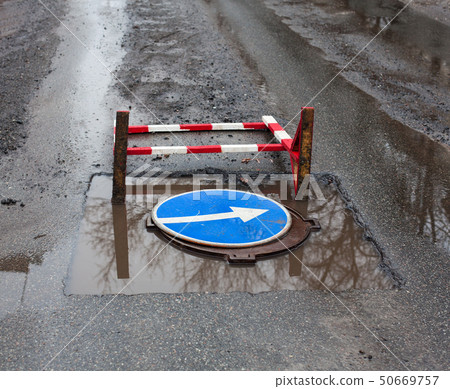 Safety barrier and turn right sign on the road Safety barrier and turn right sign on the road 50669757