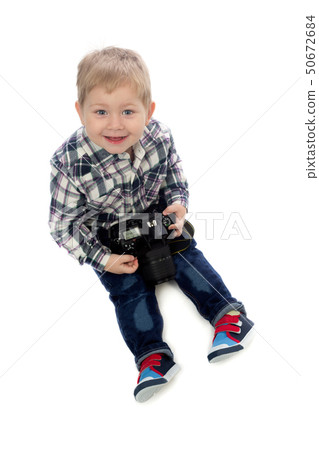 three-year boy sitting on a white background three-year boy sitting on a white background 50672684