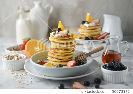 Beautiful dessert, fresh pancakes with mix fruit. Beautiful dessert, fresh pancakes with mix fruit. 50673572