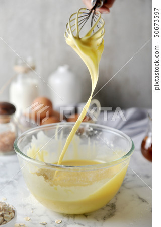 Making pancakes,cake,baking of baker hands pouring Making pancakes,cake,baking of baker hands pouring 50673597