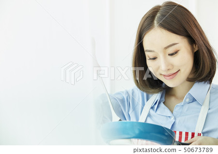 Cooking, young woman Cooking, young woman 50673789