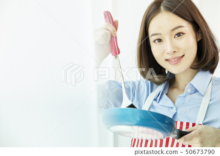 Cooking, young woman Cooking, young woman 50673790