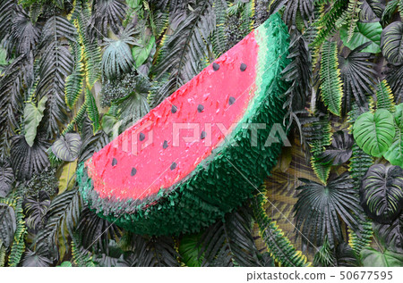 Tropical pattern with jungle leaves and watermelon Tropical pattern with jungle leaves and watermelon 50677595