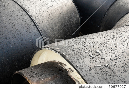 Stack of new gray metal pipes (tubes) Stack of new gray metal pipes (tubes) 50677927