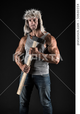 Athlete with sexy torso with sledge hammer. man Athlete with sexy torso with sledge hammer. man 50680354