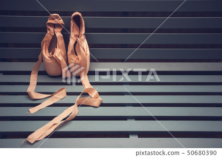 pointe shoes for ballerina on a wooden background, ballet shoes pink pointe shoes for ballerina on a wooden background, ballet shoes pink 50680390