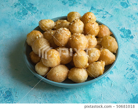 Luqaimat - traditional Arabic sweet dumplings. Luqaimat - traditional Arabic sweet dumplings. 50681018