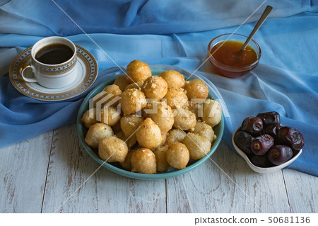 Luqaimat - traditional Arabic sweet dumplings. Luqaimat - traditional Arabic sweet dumplings. 50681136