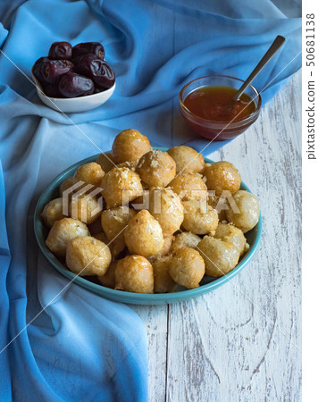 Luqaimat - traditional Arabic sweet dumplings.  50681138