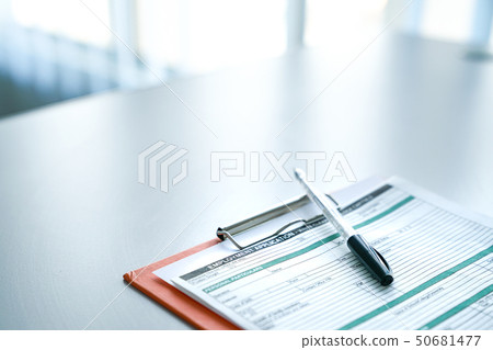 Filling the employment application form 50681477