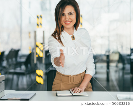 welcome friendly lady hand outstretched employment 50683216