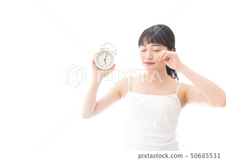 Young woman getting up early Young woman getting up early 50685531