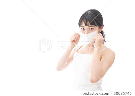 Young lady masking 50685745