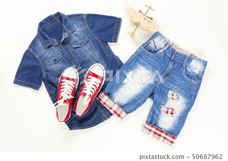 Set of stylish denim clothes, children trendy fashion clothes collage on white, flat lay, top view Set of stylish denim clothes, children trendy fashion clothes collage on white, flat lay, top view 50687962