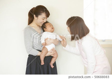Nurse and baby 50688083