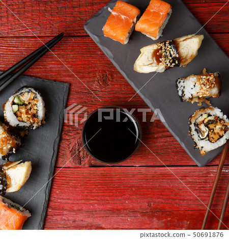 Rolls served at red table 50691876