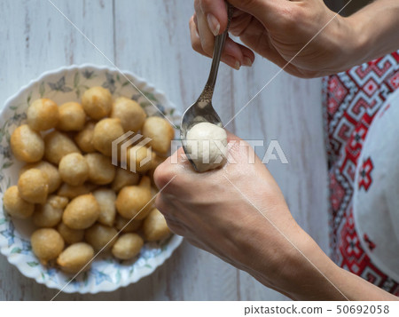 Preparation traditional Greek sweets Loukoumades Preparation traditional Greek sweets Loukoumades 50692058
