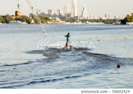 Wakeboarder ride set in wake park. 50692424