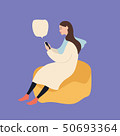 Beautiful caucasian woman sitting on a puff chair using smartphone, vector illustration on blue Beautiful caucasian woman sitting on a puff chair using smartphone, vector illustration on blue 50693364