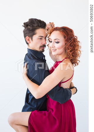Social dance, bachata, kizomba, salsa, tango concept - Close up portrait of woman man dressed in Social dance, bachata, kizomba, salsa, tango concept - Close up portrait of woman man dressed in 50693802