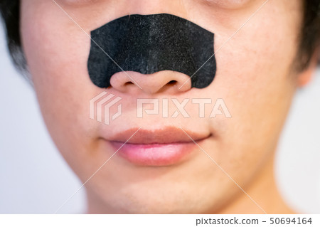Men doing nose pack Men doing nose pack 50694164