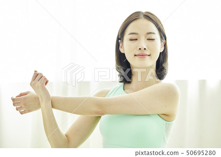 Stretching, exercise, fitness, young woman Stretching, exercise, fitness, young woman 50695280