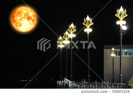 full blood moon on night sky and Naga light pole full blood moon on night sky and Naga light pole 50695826