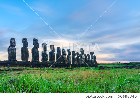 Sunrise at the Moai statues on Easter Island of Ahu Tongariki Sunrise at the Moai statues on Easter Island of Ahu Tongariki 50696349