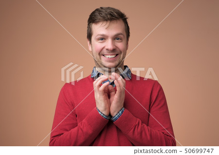 Young european man being curious about news. 50699747