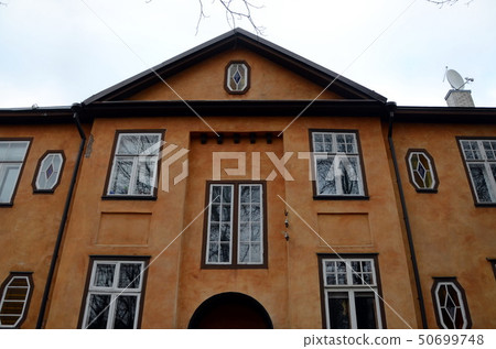Facade of  typical residential building in Tallinn 50699748