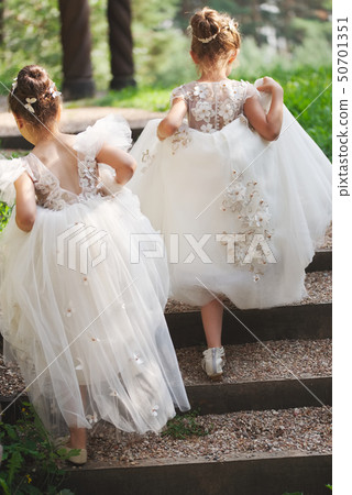 happy beautiful girls with white wedding dresses 50701351