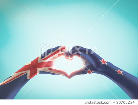 New Zealand flag pattern on people hands in heart  50703254