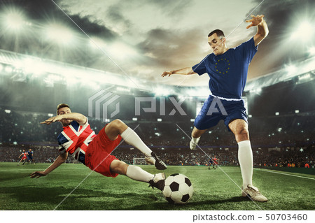 Football or soccer players colored in United Kingdom and European Unity flags 50703460