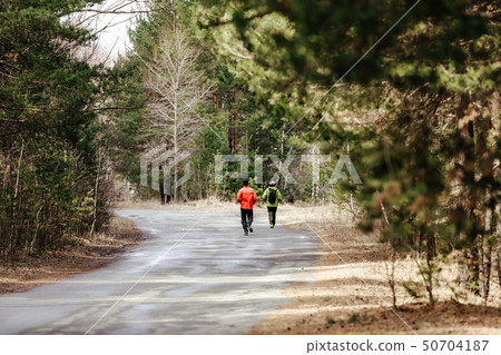 back man and woman running back man and woman running 50704187